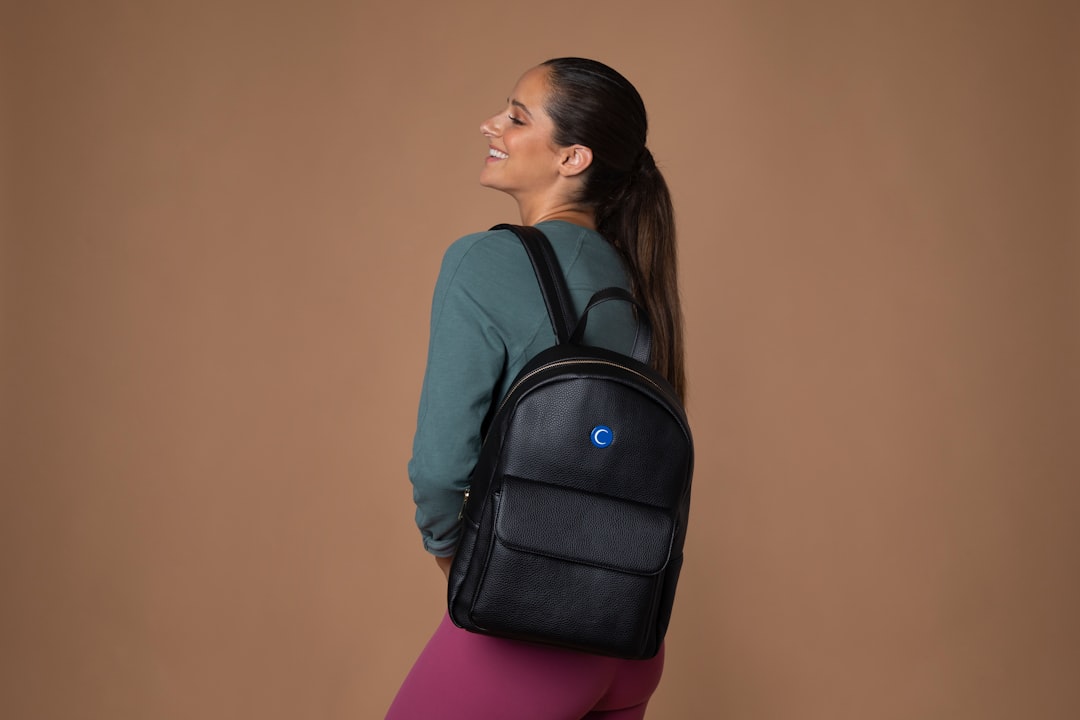 woman wearing black backpack