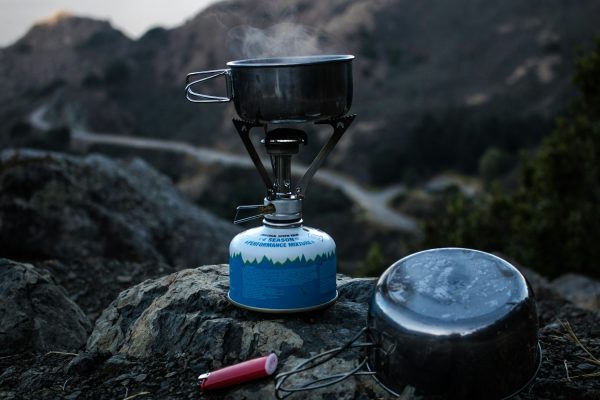 Lightweight backpacking stove and cooking pan outdoors