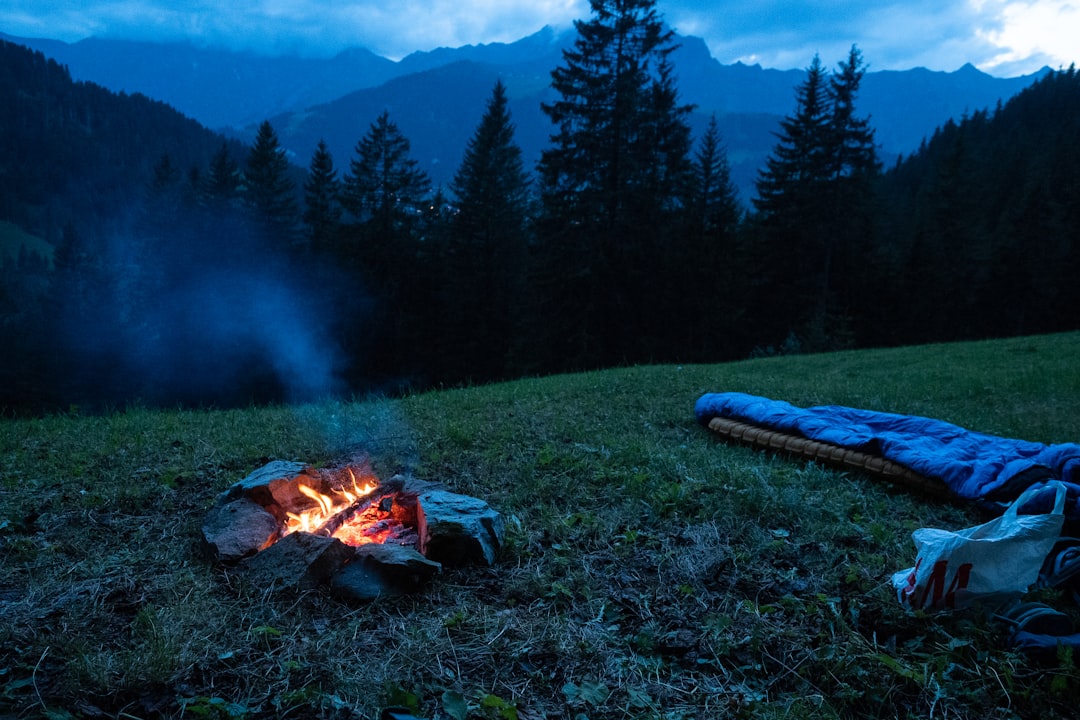camping tent on cliff during golden hour