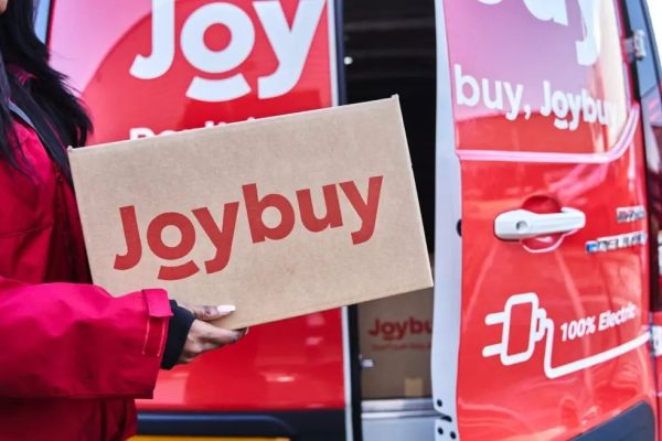 Joybuy electric delivery van loading a package in France