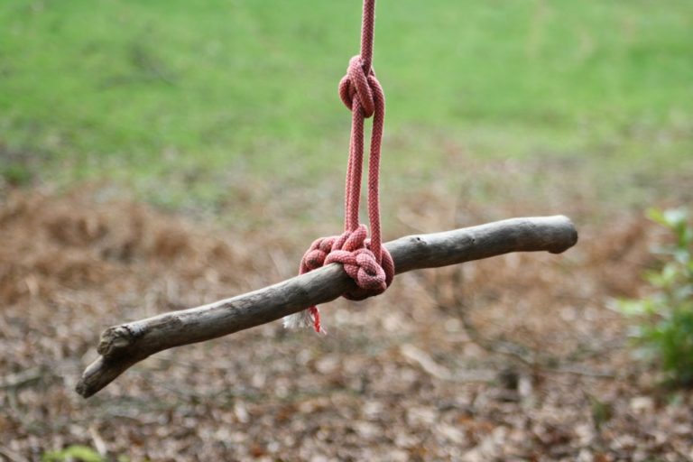brown rope on blue wooden table