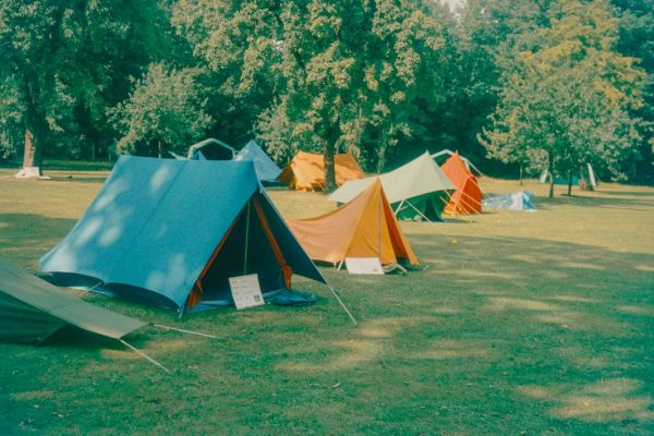 A campsite with many colorful tents is seen