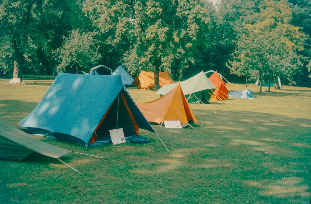 A campsite with many colorful tents is seen